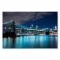 Preview: Atemberaubende Nachtaufnahme der beleuchteten Brooklyn Bridge mit der glitzernden Skyline von New York City im Hintergrund.