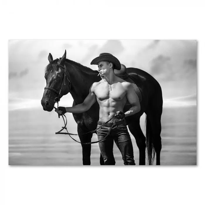 Ein Cowboy mit seinem Pferd am Strand - ein Bild voller Freiheit und Stärke.