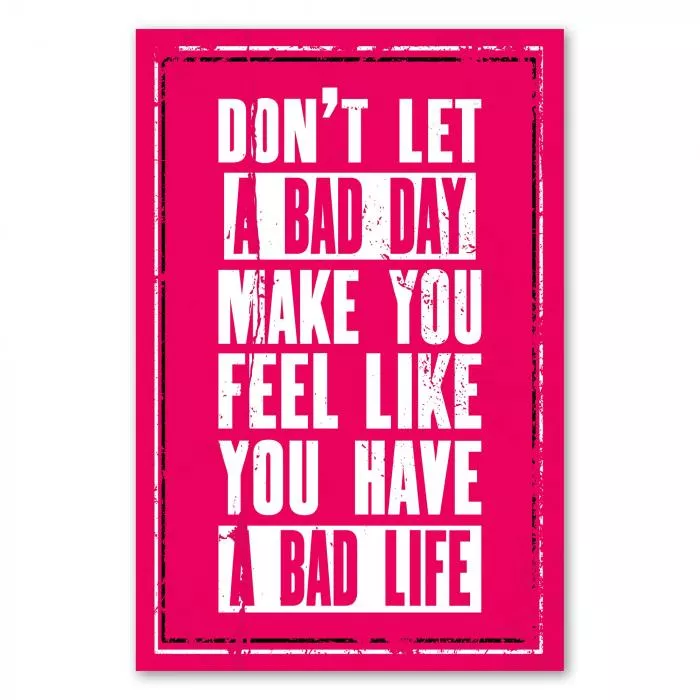 Motivationsspruch auf pinkem Hintergrund: „Don't let a bad day make you feel like you have a bad life“.