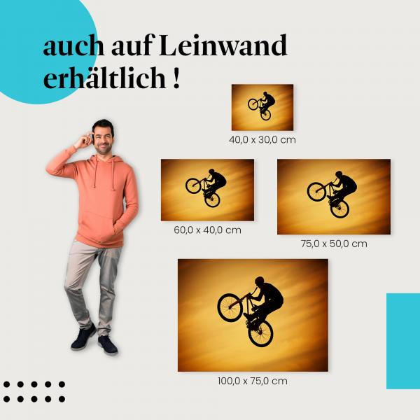 Leinwandbild "BMX-Fahrer im Sonnenuntergang": Sport & Freiheit auf Leinwand